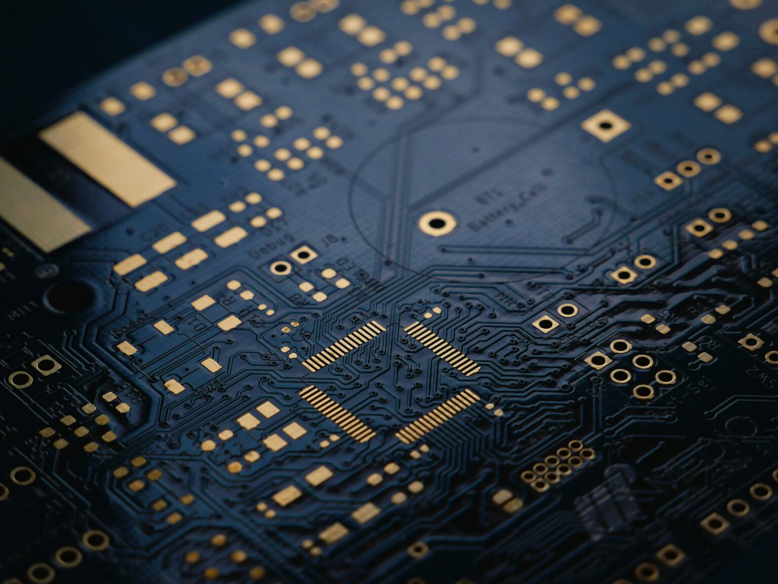 Close-up of a high-density printed circuit board (PCB) featuring fine-pitch routing and advanced interconnect technology.